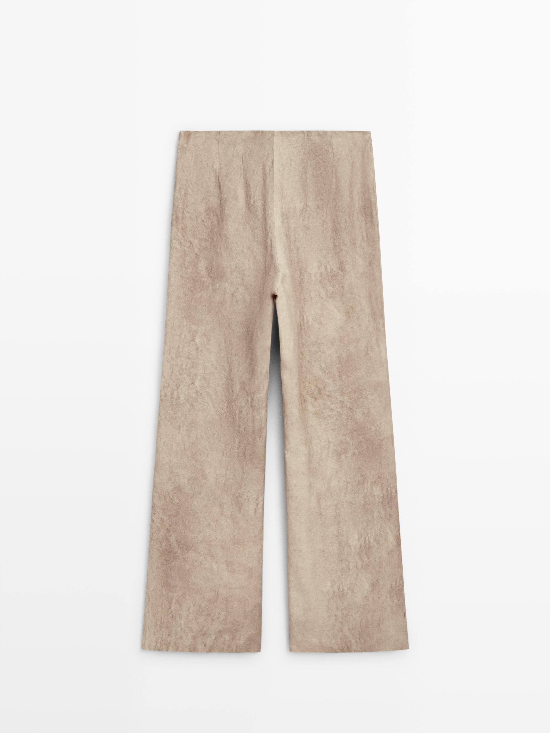 Distressed-effect flowing trousers